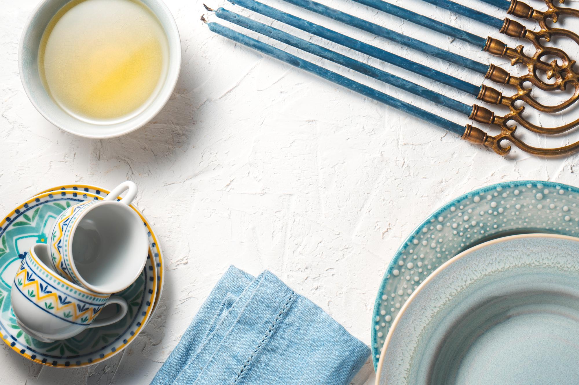 stack of ceramic dishes and linen napkins
