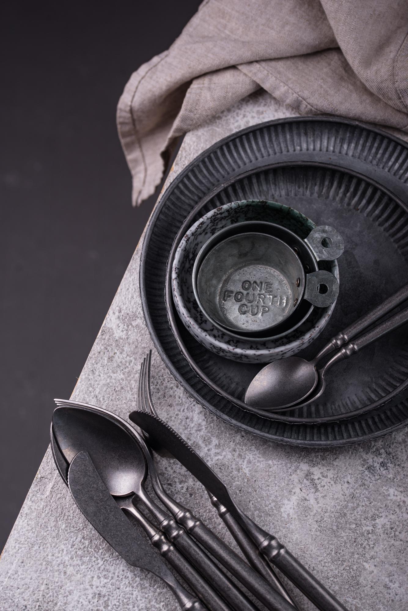 selection of tasting plates on dark surface